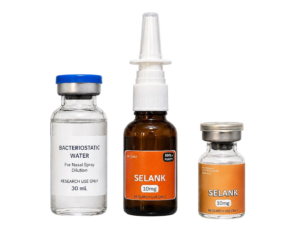 Selank Nasal Spray Research Kit with 10mg Selank vial, 30ml bacteriostatic water, and a clear glass nasal spray bottle on a white background